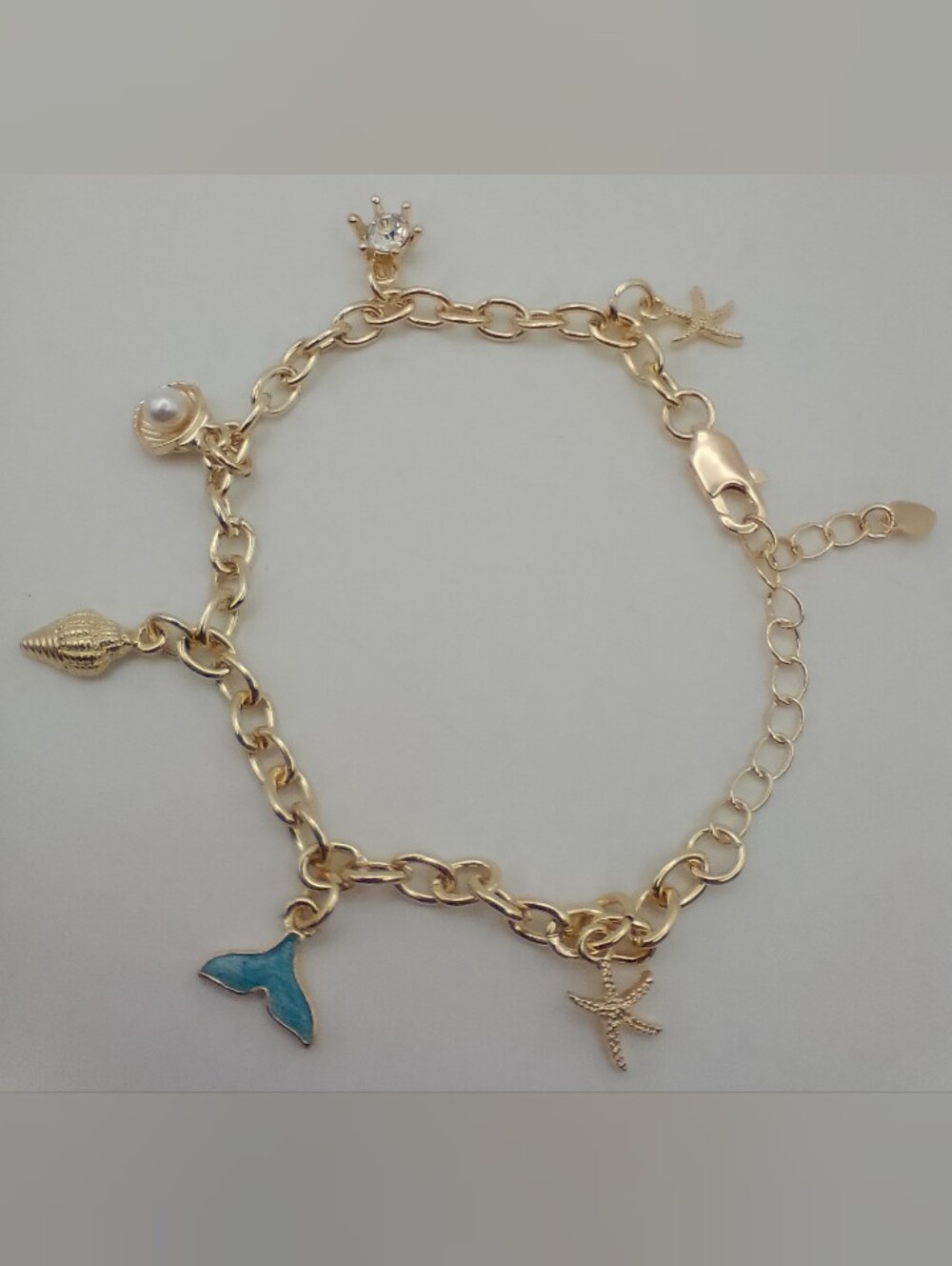 Gold Tone Sea Charm Bracelet with Blue Whale Tail- Brand New